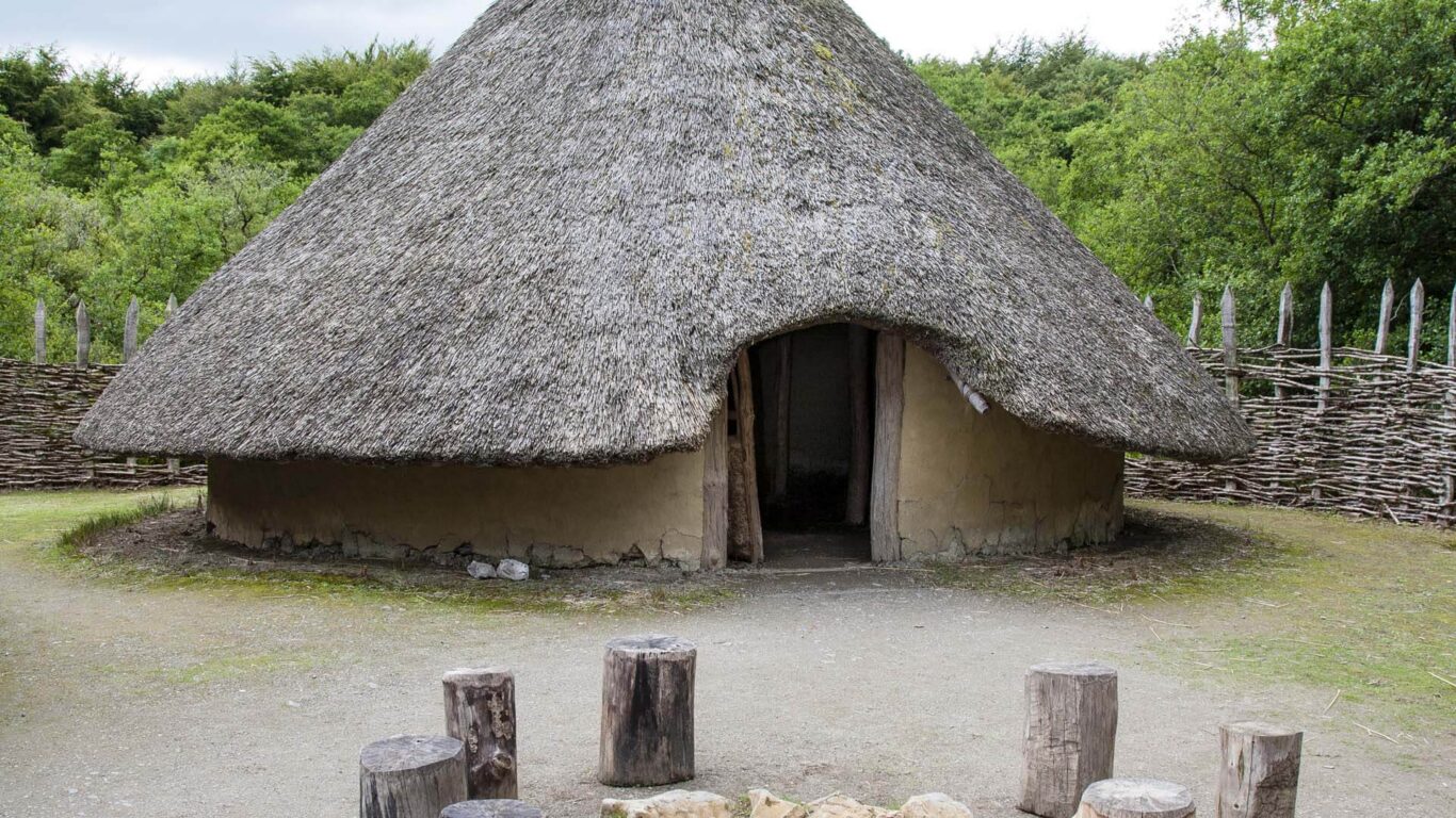 Reconstructed thatched roundhouse at Craggaunowen Pre-Historic Park in County Clare.